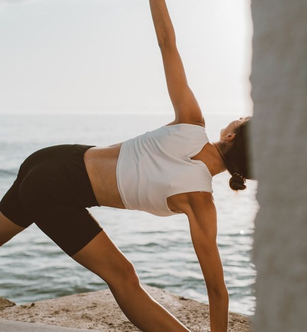 Close-up of a person stretching, focusing on flexibility and form.